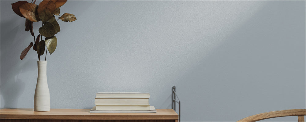 Light Grey Blue paint called Lie-in by COAT Paints the eco friendly paint company