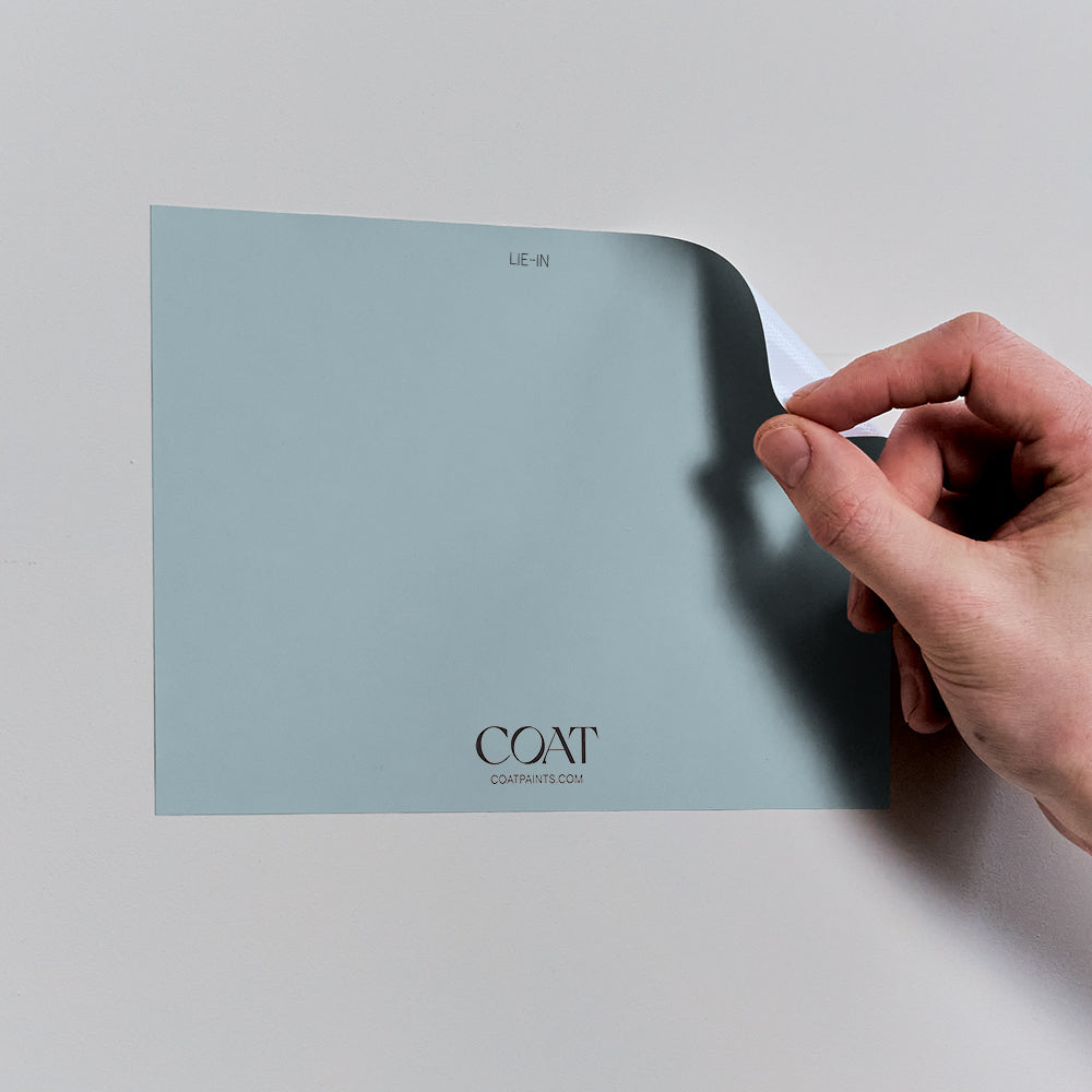 Paint sample peel of Lie-in, a soft grey-blue paint by COAT Paints