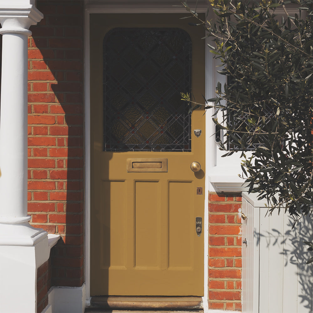 Ochre Yellow paint called Miles From Monday by COAT Paints the eco friendly paint company