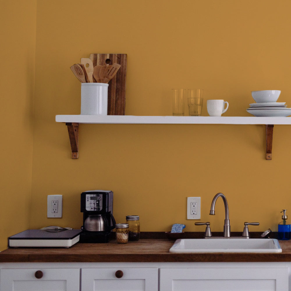 Ochre Yellow paint called Miles From Monday by COAT Paints the eco friendly paint company