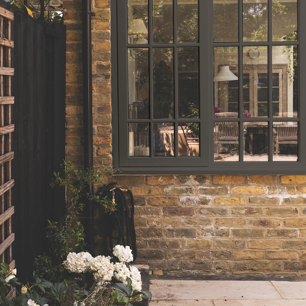 Dark Greige paint called Hardback by COAT Paints the eco friendly paint company